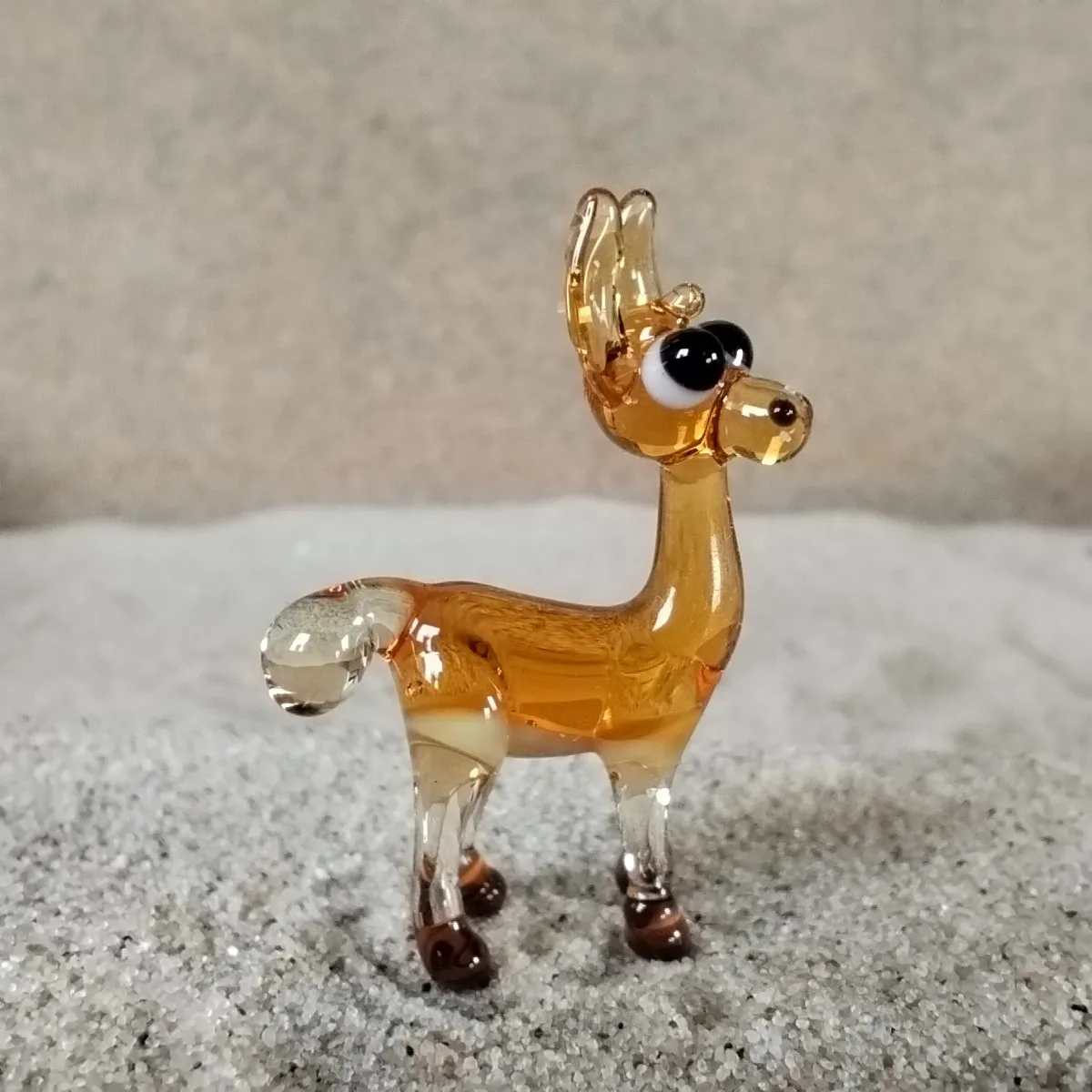 Skleněná figurka lamy