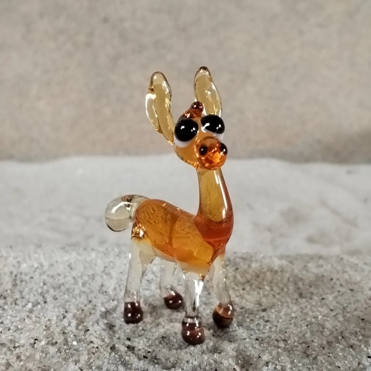 Skleněná figurka lamy