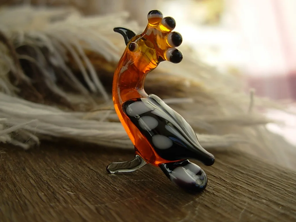 Skleněná figurka dudka