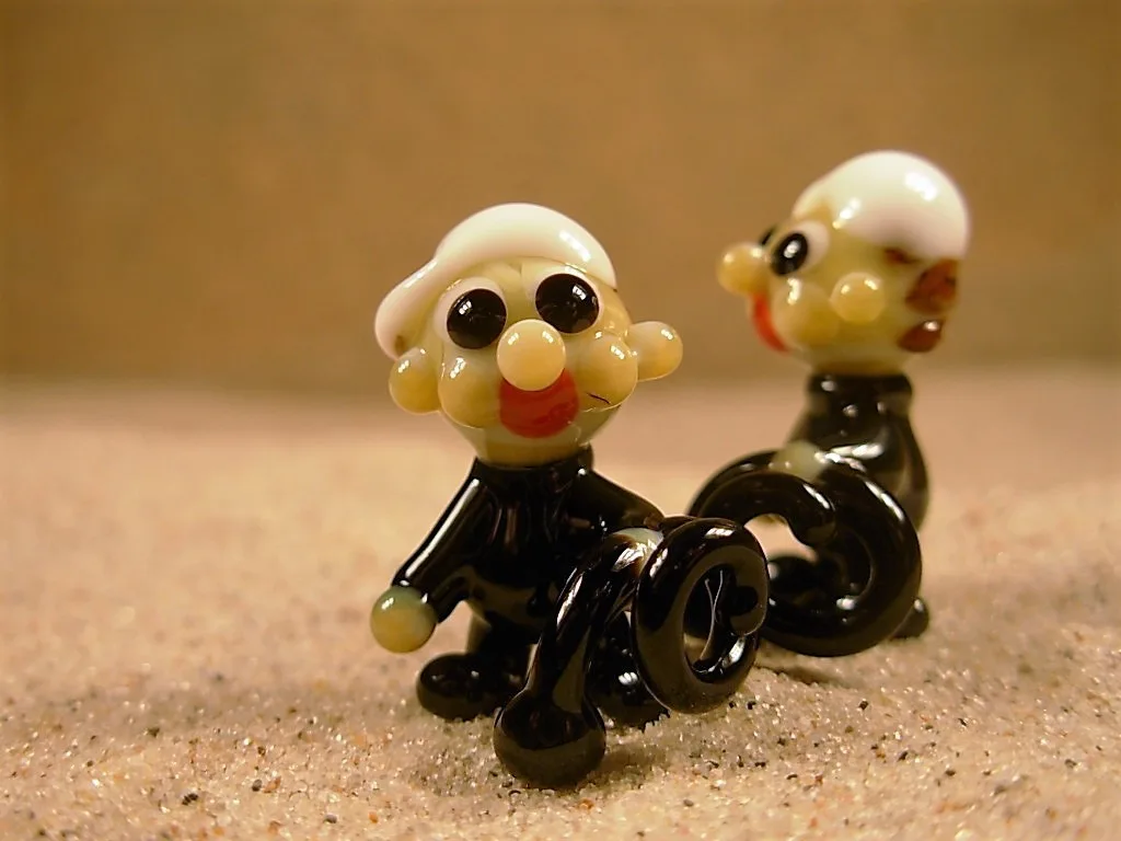 Skleněná figurka kominíka