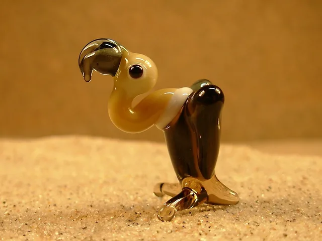 Skleněná figurka supa
