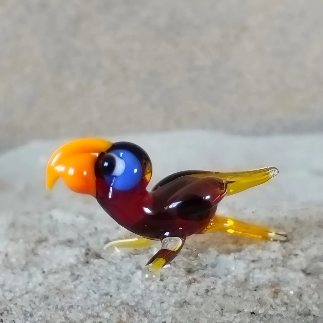 Skleněná figurka papouška