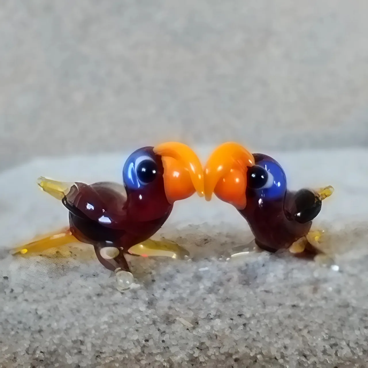 Skleněná figurka papouška