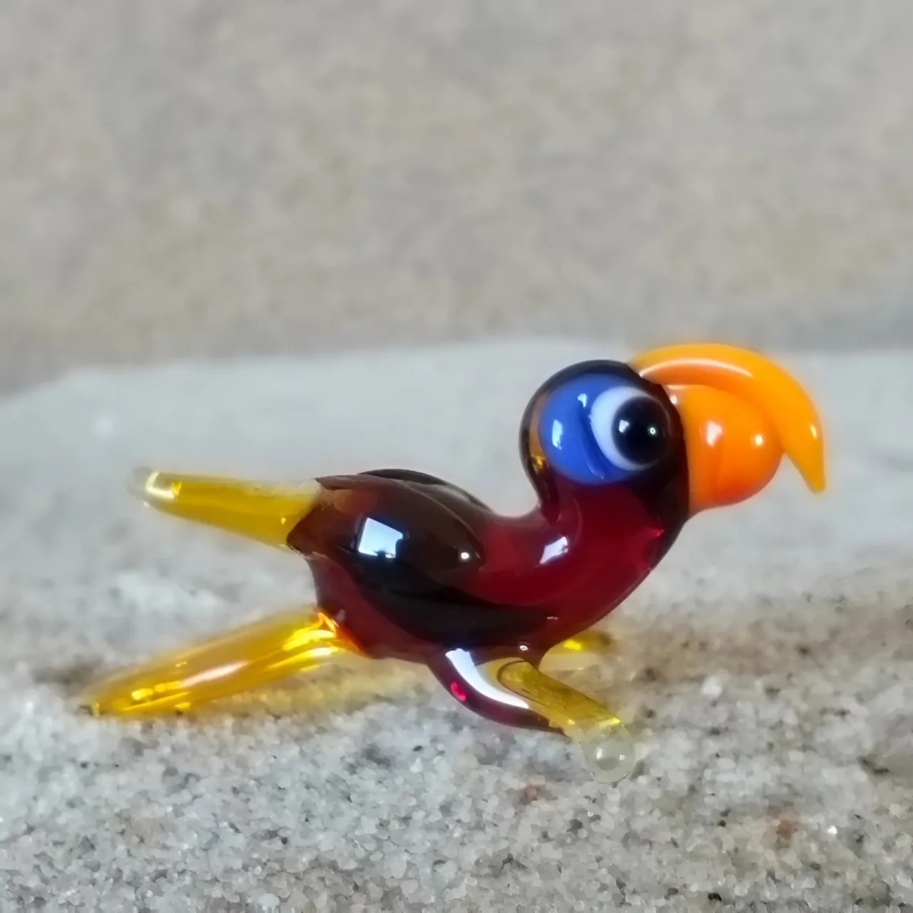 Skleněná figurka papouška